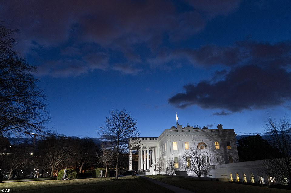 The only lights on were in the Residence and parts of the West Wing, where movers were seen loading up trucks