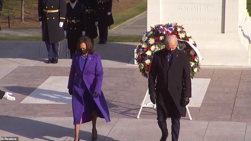 Vice President Kamala Harris (left) and President Joe Biden (right) participate in a wreath-laying ceremony at the Tomb of the Unknown Soldier