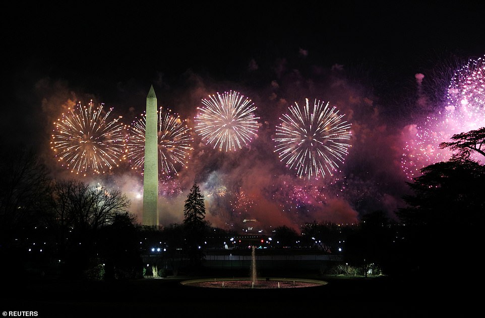 Fireworks burst over the Washington Monument during the "Celebrating America" event after the inauguration of Joe Biden