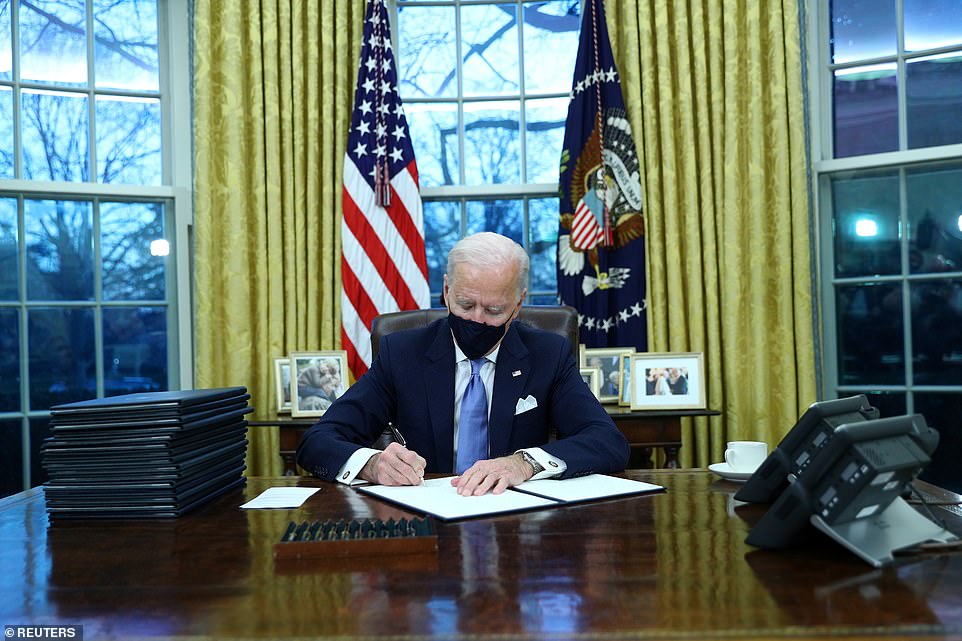 President Joe Biden appeared in the Oval Office for the first time on Wednesday afternoon to sign new executive orders and read the 'private' letter Donald Trump left for him