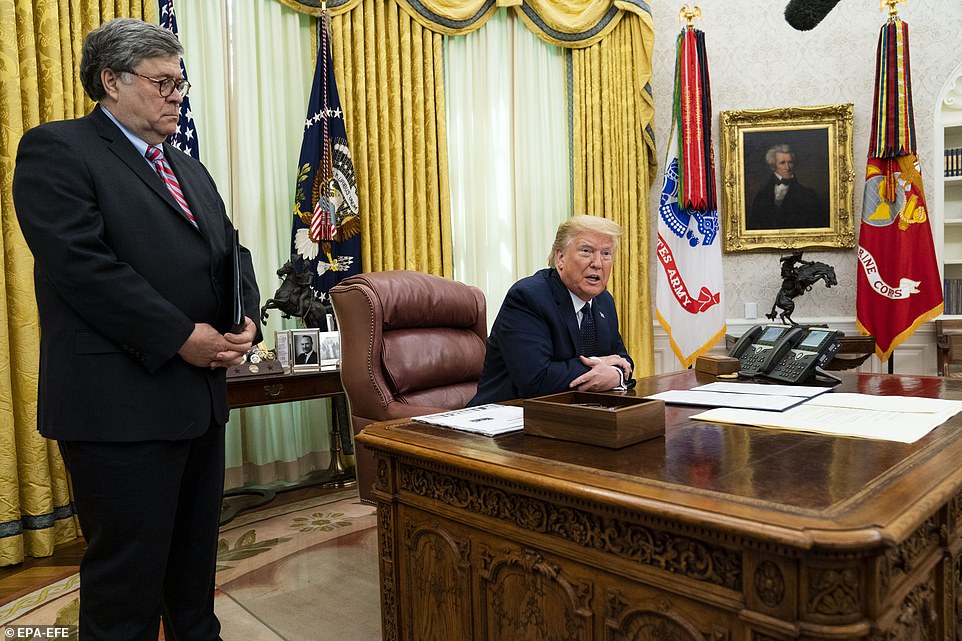 President Donald J. Trump (R) with Attorney General William Barr (L), make remarks before signing an executive order on social media that will punish Facebook, Google and Twitter for the way they police content online, in the Oval Office, White House, Washington, DC, USA, 28 May 2020