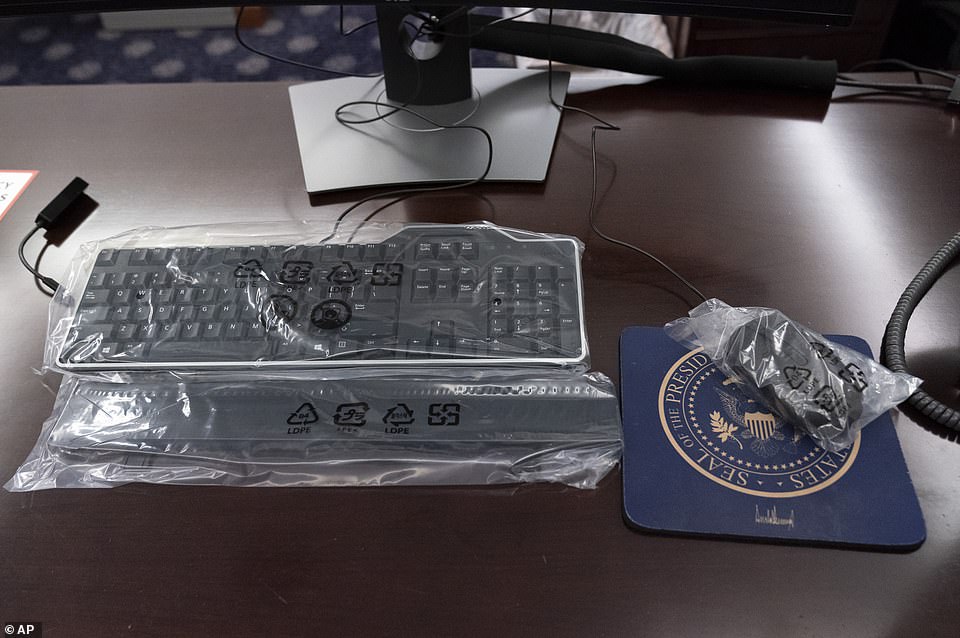 A keyboard and mouse are wrapped in plastic waiting for the new Press Secretary on Wednesday morning