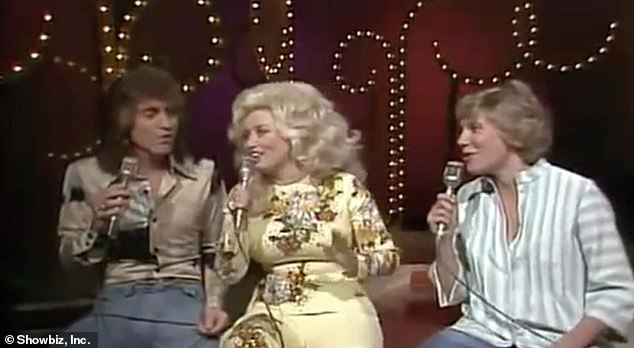 Good times: Randy, Dolly and Canadian singer Anne Murray are seen in 1977 above
