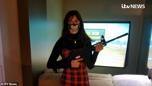 Williams faces two felony and two misdemeanor charges that could potentially land her in jail for more than 30 years with fines of more than $600,000 for her part in the riot. An image shared by ITV shows Williams posing with a rifle and a skull emblazoned face mask