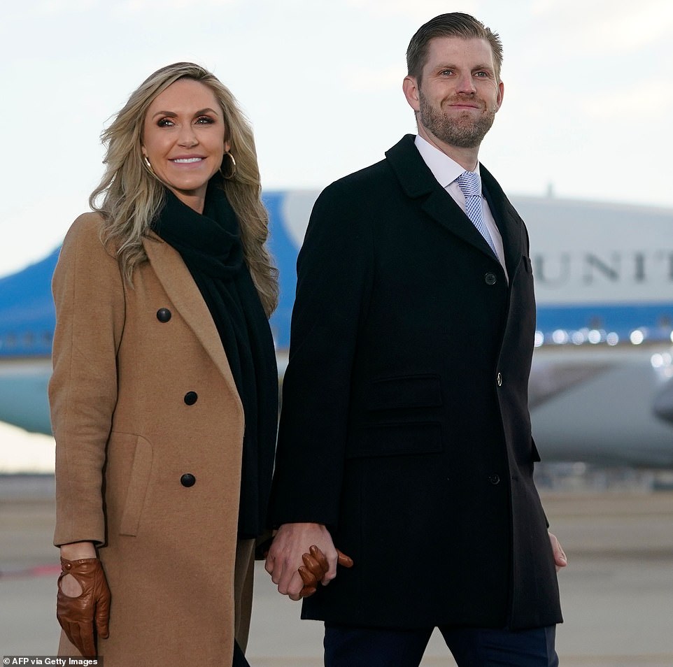 On their way: Eric and Lara held hands as they arrived at the event at Joint Base Andrews - where they later took off on a flight bound for Florida