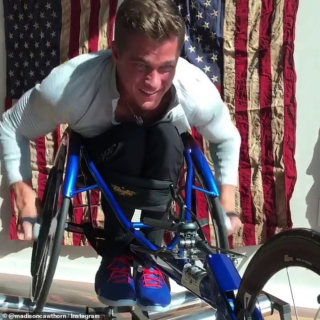 Cawthorn, who was paralyzed from the waist down in a 2014 car crash, previously claimed on social media he was training to compete in the 2020 Tokyo Paralympic Games. In a February 2019 post (above), Cawthorn said he was 'pursuing this world record'