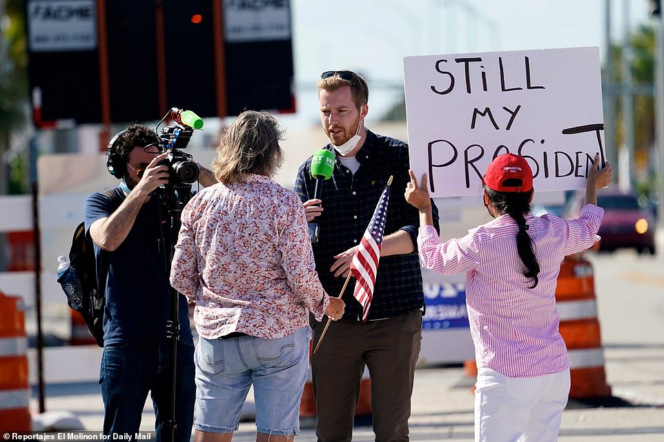A group of Trump fans were seen being interviewed as they rallied for the former president on Saturday