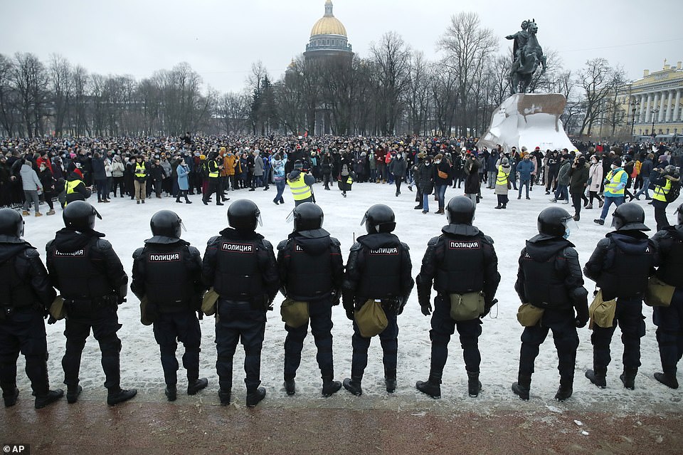 Police stand guard during a protest against the jailing of opposition leader Alexei Navalny in St. Petersburg, January 23