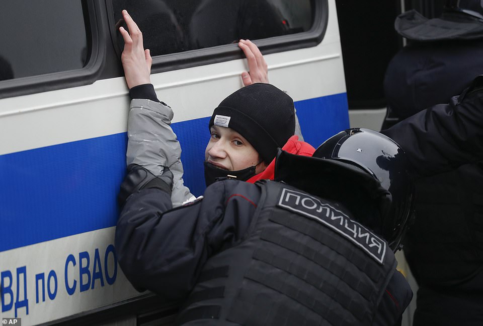 Pictured: Russian police are arresting protesters demanding the release of top Russian opposition leader Alexei Navalny at demonstrations in the country's east and larger unsanctioned rallies are expected later in Moscow and other major cities