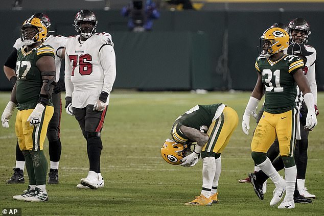 Packers' Jaire Alexander reacts after being called for pass interference against Tampa Bay