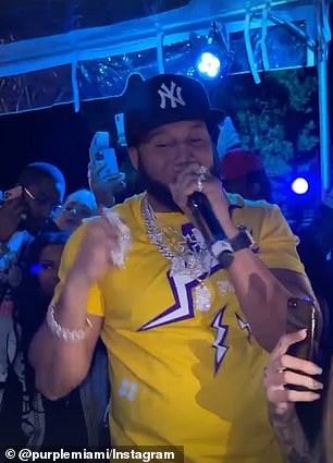 Dominican recording artist El Alfa pictured performing at the bash