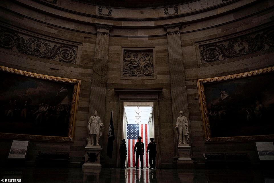 Grand setting: The Rotunda of the Capitol under heavy security ahead of the walking of the article of impeachment