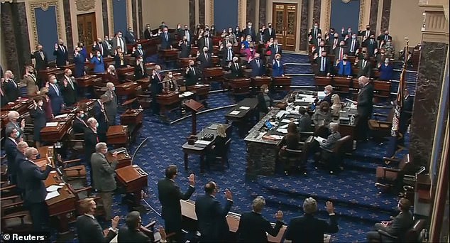 The 100 senators - 50 Democrats and 50 Republicans - were sworn in as Donald Trump's jury