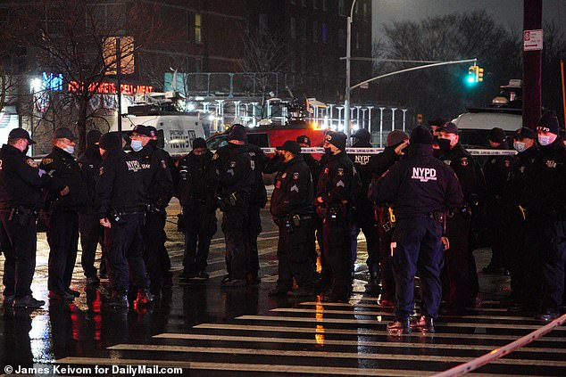 Officers showed up in force to investigate the shooting of their fellow NYPD officer, an incident that marked the third shooting of an NYPD officer in as many months