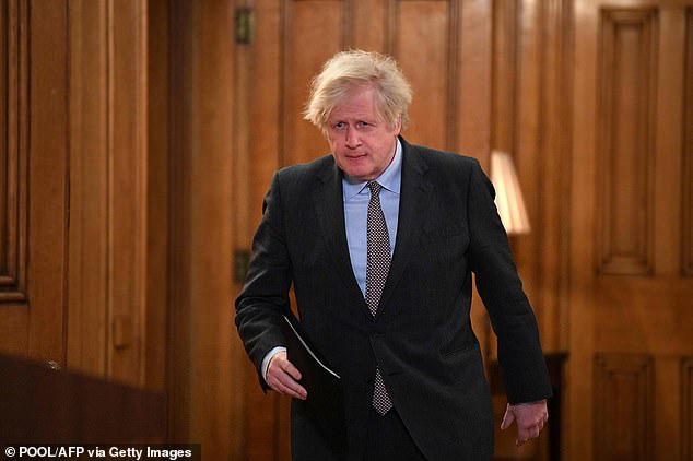 Boris Johnson (pictured) met officials yesterday to put the finishing touches to the Australian-style scheme, which is being introduced following concerns about new Covid variants