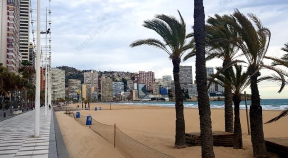 A deserted Levante beach in Benidorm today as the Government urged Britons not to book summer holidays in yet another blow for struggling airlines and holiday companies