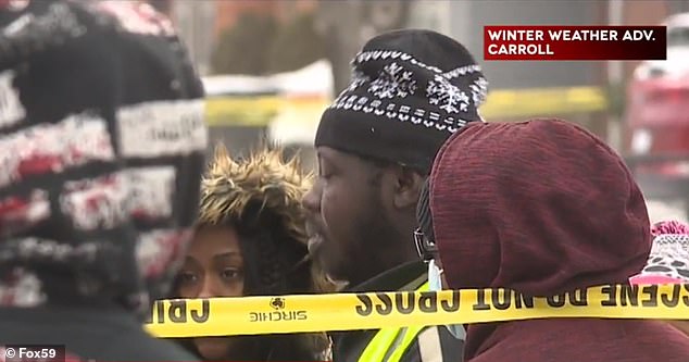 Neighbors and loved ones gathered at the scene to console each other on Sunday
