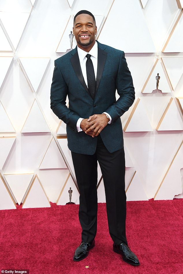Tough: The retired defensive end retired from the NFL in 2007 and broke record throughout his career, including the most sacks in a 16-game campaign in 2001, before spinning off to a successful career in television, as he is seen at The Oscars in February 2020