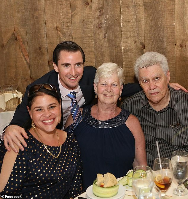 Gill is seen in a family photo with his mother Elaine and family members.The Gill family have a lot to celebrate – as long as the financial guru sells in time