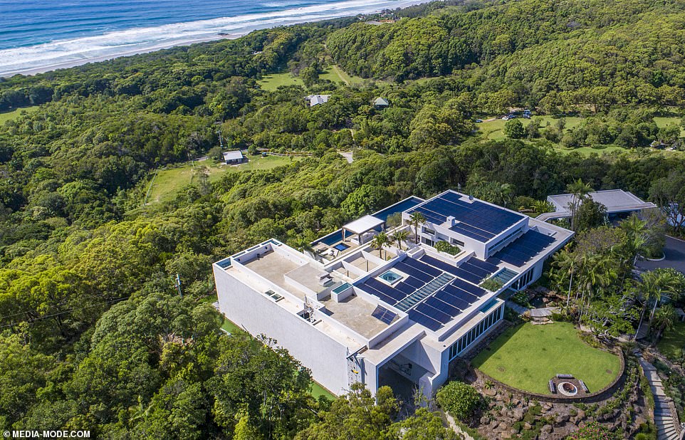 Hard work: Chris and his family began construction on the Byron Bay mansion, named Kooeloah, in late 2017. It was previously an eight-bedroom resort-style home