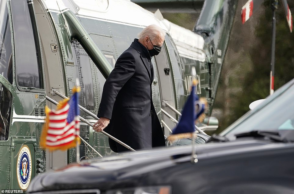 President Biden steps of Marine One after arriving at Walter Reed