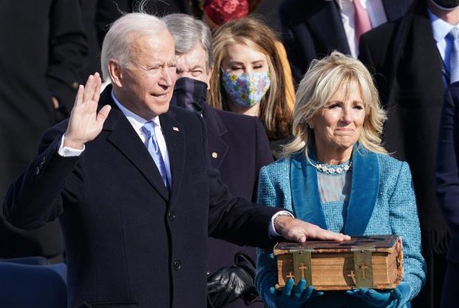 Assuming US presidency, Biden tells divided nation ‘democracy has prevailed’