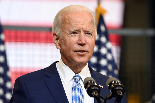 Biden to reinstate Covid travel rules, add South Africa