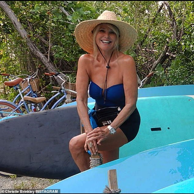 Christie Brinkley, 66, proves she still has a pinup figure as she models a strapless swimsuit