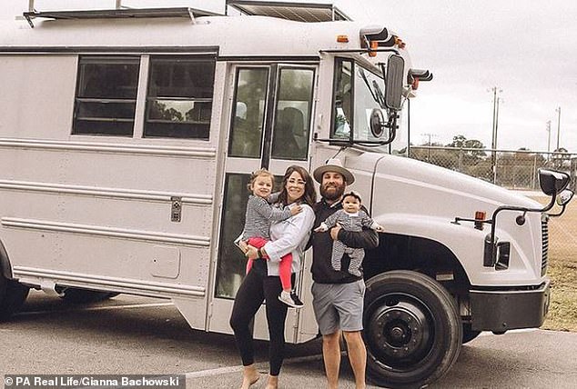 Couple sell their home and all their possessions to live and work in a souped-up school bus
