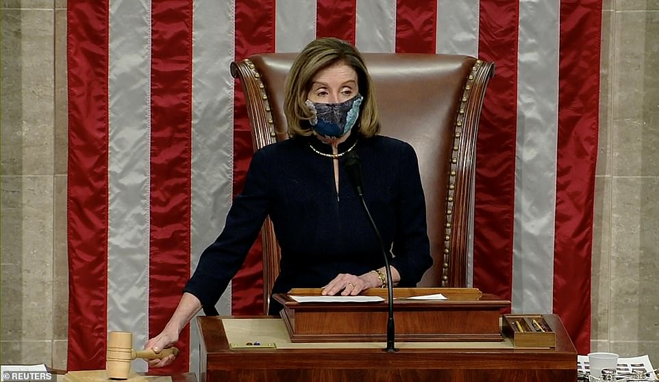 Bringing down the hammer: Nancy Pelosi gavels the end of the voting and declares that Donald Trump has been impeached again 232-197 - 10 of the majority votes coming from Republicans