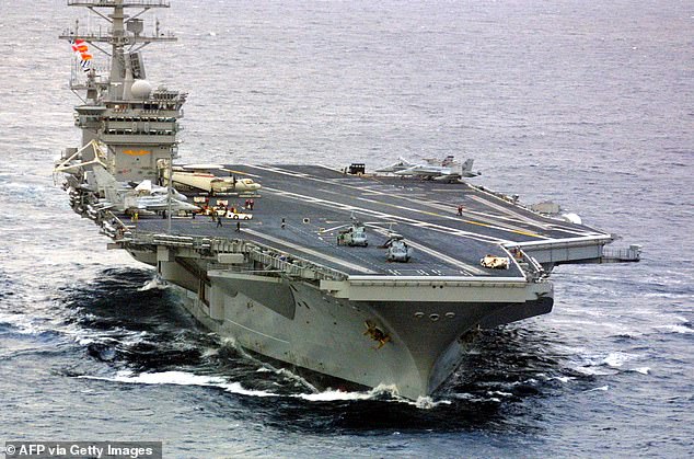 American spy satellites did track the missile launch from the Islamic Republic, but it is unclear if the Nimitz aircraft carrier  (pictured) tracked the launch