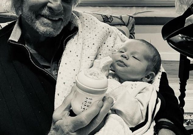 Michael Douglas, 76, sees his month old grandson Ryder T. Douglas for the first time