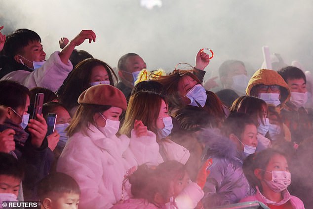 Thousands of revellers in Wuhan celebrated the New Year together with no social distancing in sight