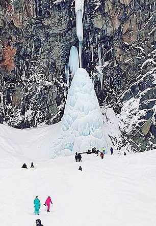 Tourist is killed and four more are trapped under huge icicles at a Russian beauty spot