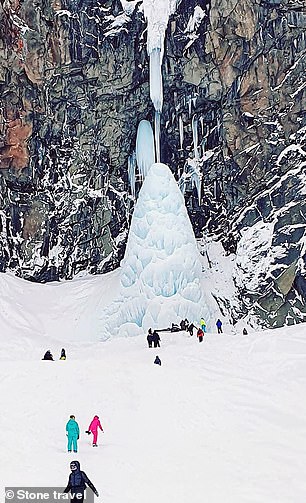 Tourist is killed and four more are trapped under huge icicles at a Russian beauty spot