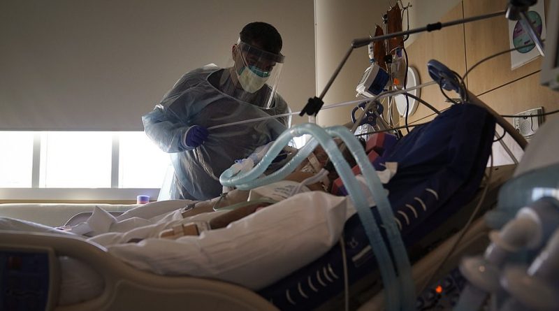 US sets another record for COVID hospitalizations with 128K