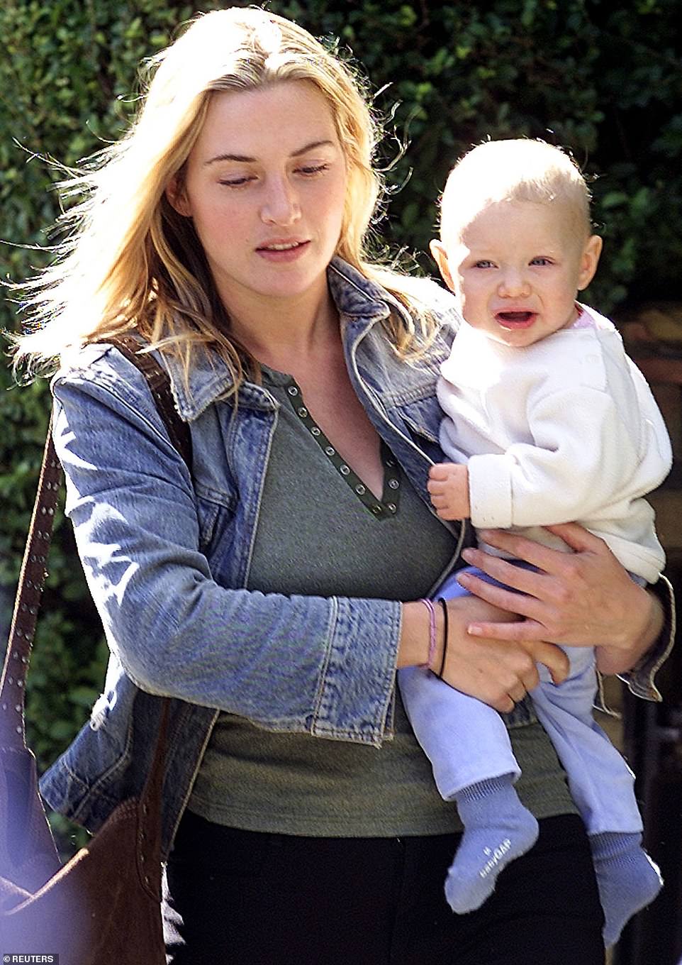 Way back when: The actress, 45, welcomed her eldest child in 2000 with her first husband Jim Threapleton, they split one year later in 2001 (Kate and a then baby Mia pictured in 2001)