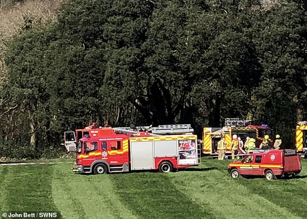 Emergency vehicles surround the scene in Helston where the jet crashed around 9am