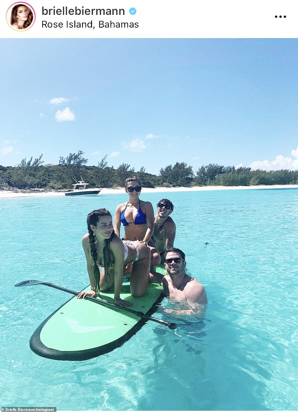 Sassy talk: The young model said in her caption: 'Photo dump of our boat day in the Bahamas☀️ *it’s the video of tommy saying he’ll “stabilize this b**ch” by holding on to my ass for me*'
