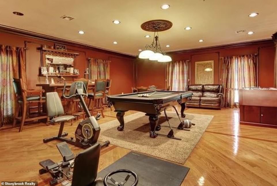 Fashion and function: The home is also equipped with a billiards room that at the moment also contains some exercise equipment enabling the TV icon to stay svelte