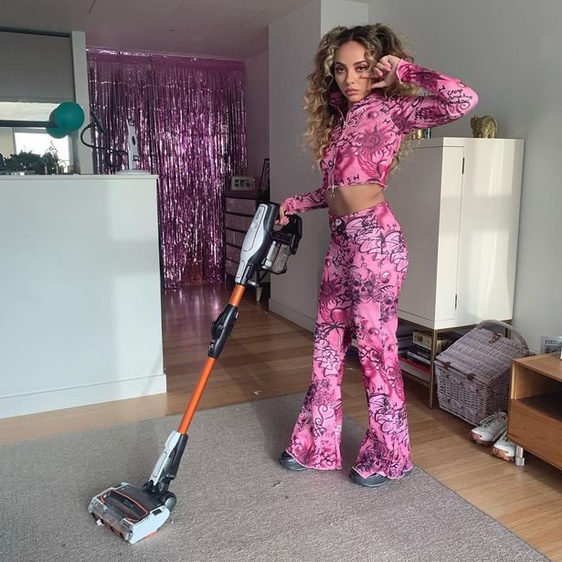 Jade Thirlwall shares glimpse of pink £1m home as she vacuums in tiny crop top