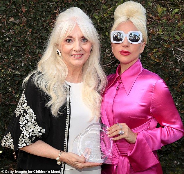 Family resemblance: Lady Gaga's (right) mother  Cynthia Germanotta (right) has revealed that 'everyone is doing as well as they can' after the dognapping crisis last month