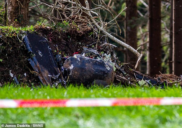 The Ministry of Defence (MoD) said the crew are members of the 736 Naval Air Squadron and were on a flight from RNAS Culdrose, which is based on the Lizard peninsula near Helston. Pictured, the wreckage of the jet