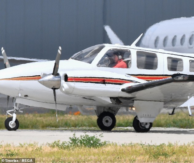 Jenner regaled a story where she was sitting at her Malibu hangar and a fellow private plane owner told her he was upping sticks from the Golden State. The reality star is seen flying her private plane in California in April