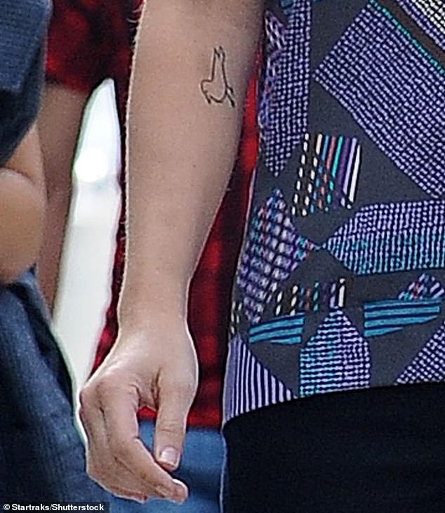 Placement: The new tattoo is placed smack dab in between two tattoos Drew has already gotten applied on her right forearm