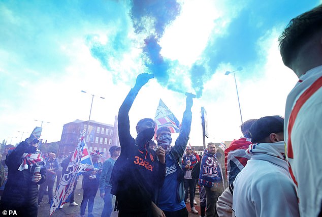 Fans let off flares before Rangers' clash with Aberdeen on the final day of the league season