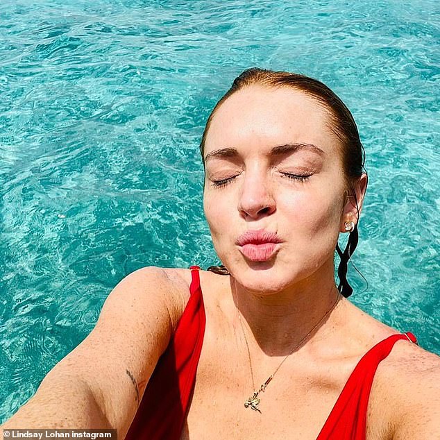 Kiss for my fans! In another image, the Freaky Friday actress is seen in close up with no makeup on as she looks radiant with her eyes closed and her lips puckered up