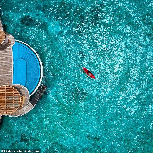 Taken from her hotel room: The former child actress shared this incredible image of a kayaker in the ocean near the hotel
