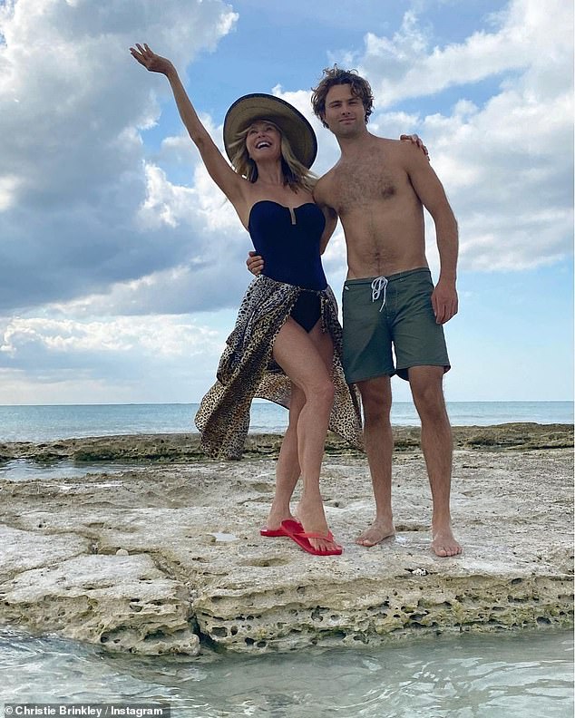 Her boy: And on Sunday the mother-of-three reminded her Instagram followers how she still looks great in a swimsuit as she shared several images with her son Jack while in the Caribbean