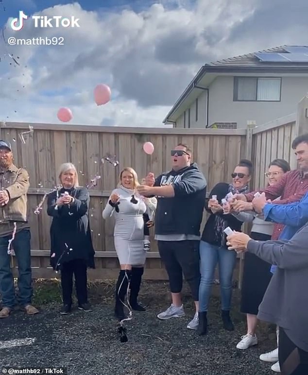 After the man processes the pink balloons, his reaction quickly turns to one of disappointment